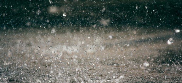 heavy rain falling on asphalt
